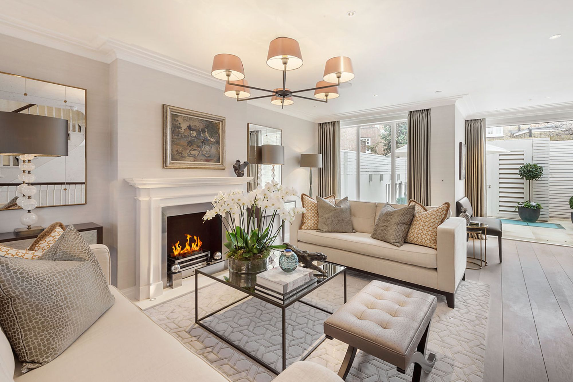 Modern living room interior with warm golden evening lighting and architectural furniture